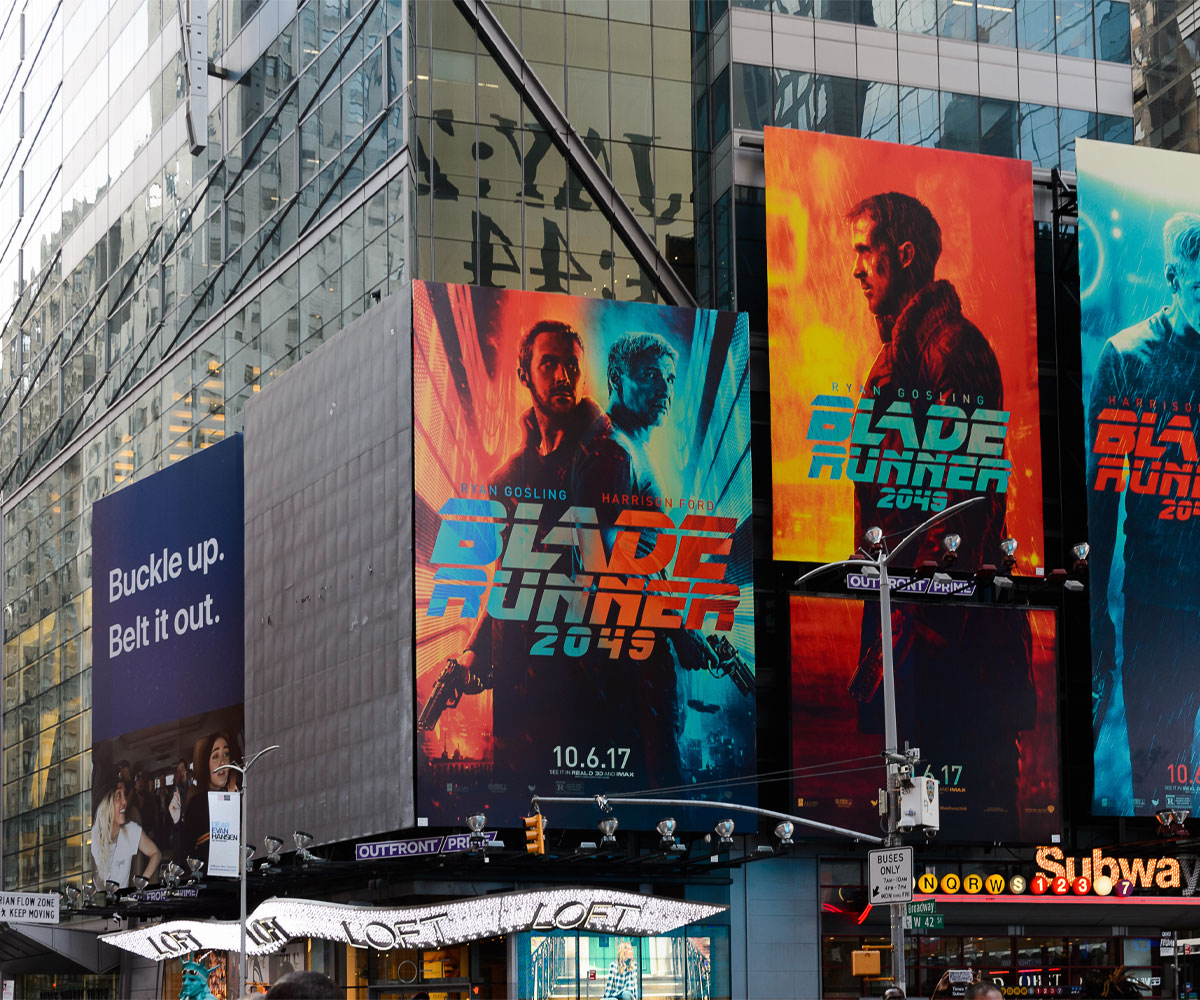 A bilboard showing an advertisement for the film Bladerunner 2049 .